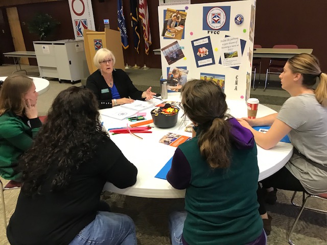 group of people at a conference table