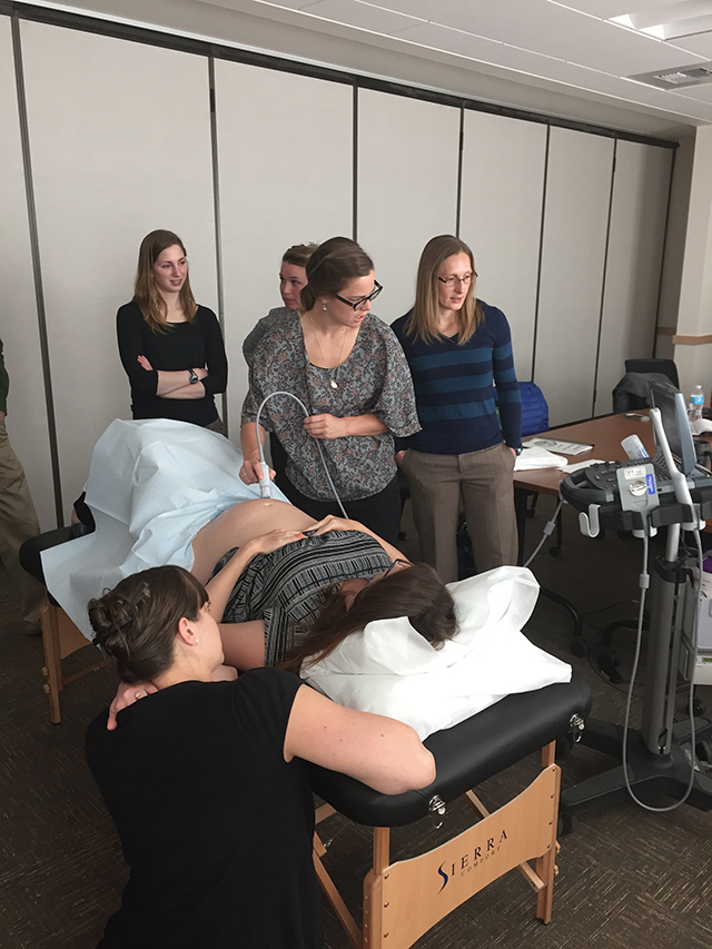 students observing medical demonstration